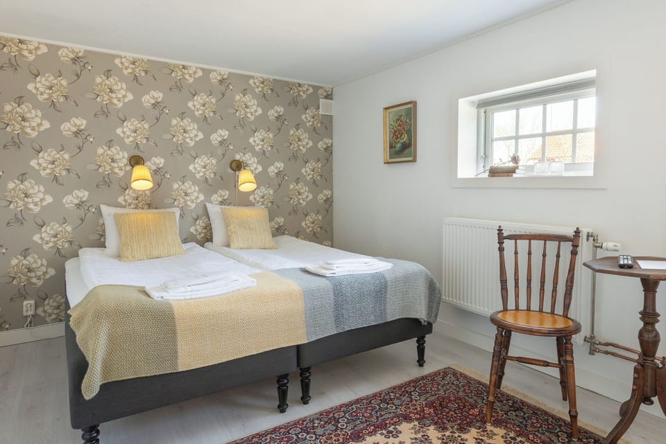Double Room, Partial Sea View | Iron/ironing board, free WiFi, bed sheets