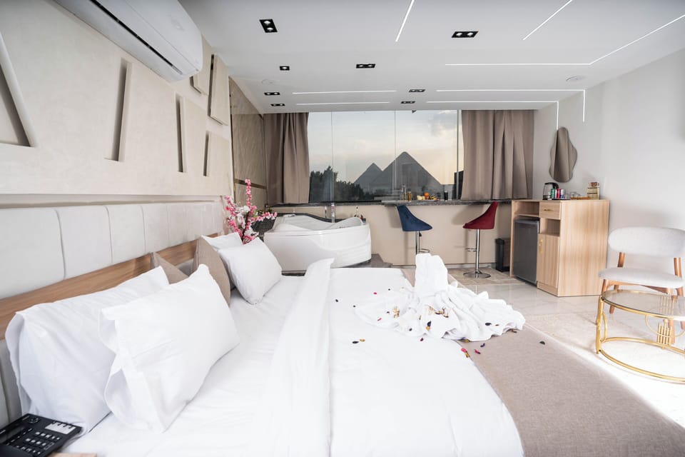Egyptian cotton sheets, premium bedding, minibar, desk