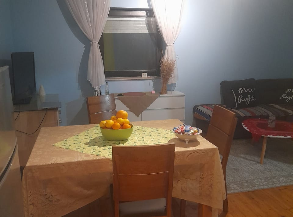 House (Holiday Home Village Paradise) | Living room | 32-inch flat-screen TV with cable channels