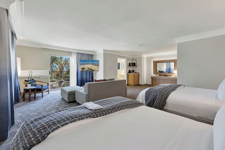 Suite, 2 Queen Beds, Balcony, City View (with Sofabed) | Premium bedding, in-room safe, desk, blackout drapes