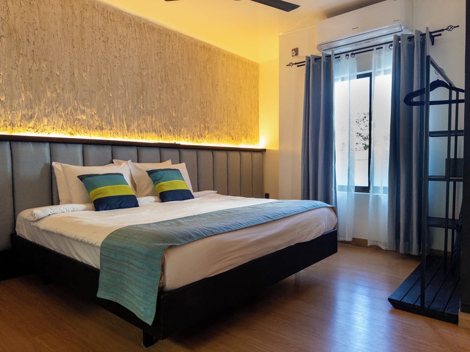 Deluxe Double or Twin Room, Balcony, Pool View | In-room safe, desk, laptop workspace, blackout drapes
