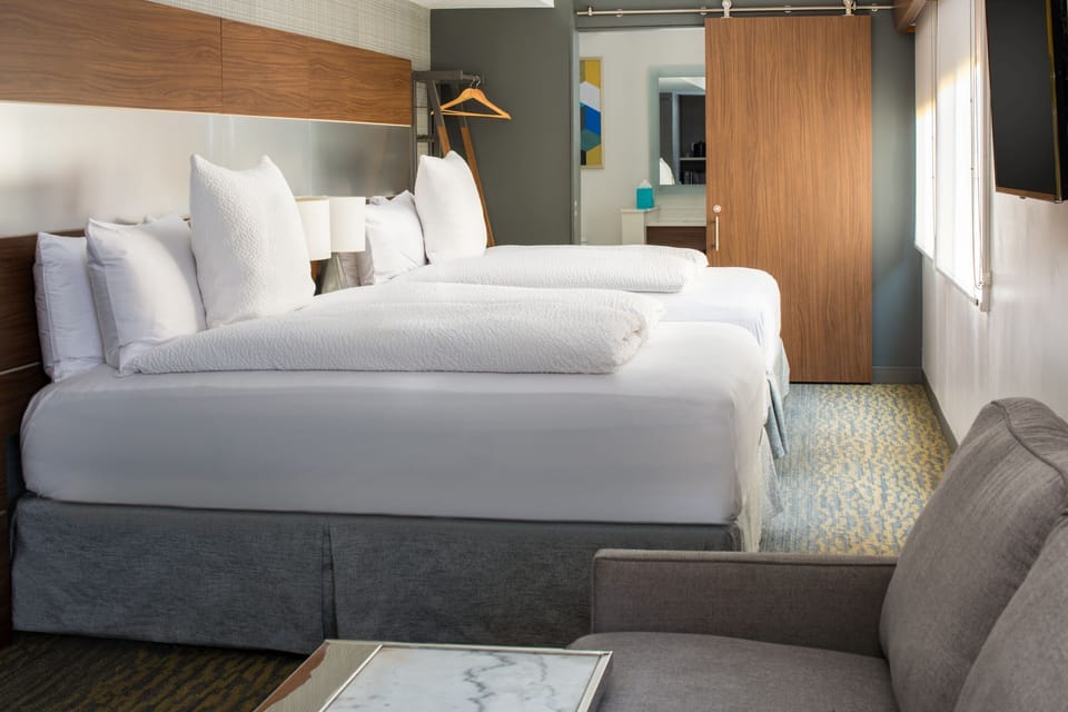 Premium bedding, pillowtop beds, desk, laptop workspace