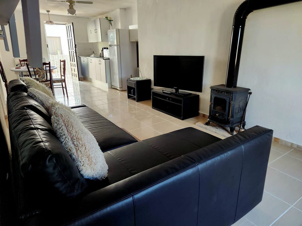 Apartment | Living area | TV, fireplace