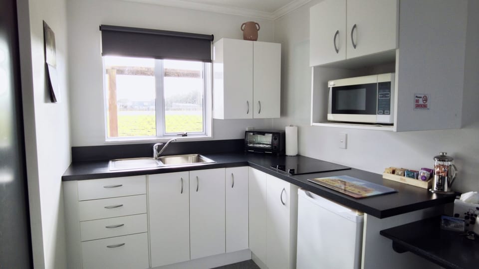 Comfort Studio | Private kitchen | Microwave, stovetop, highchair, cookware/dishes/utensils