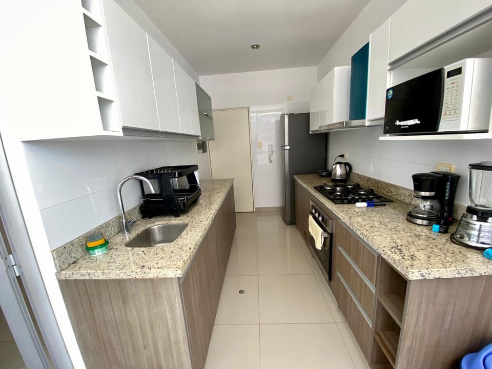 Family Apartment, Balcony, Pool View | Private kitchen