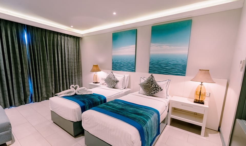 Deluxe Double or Twin Room, Balcony, Beach View | Desk, laptop workspace, free WiFi