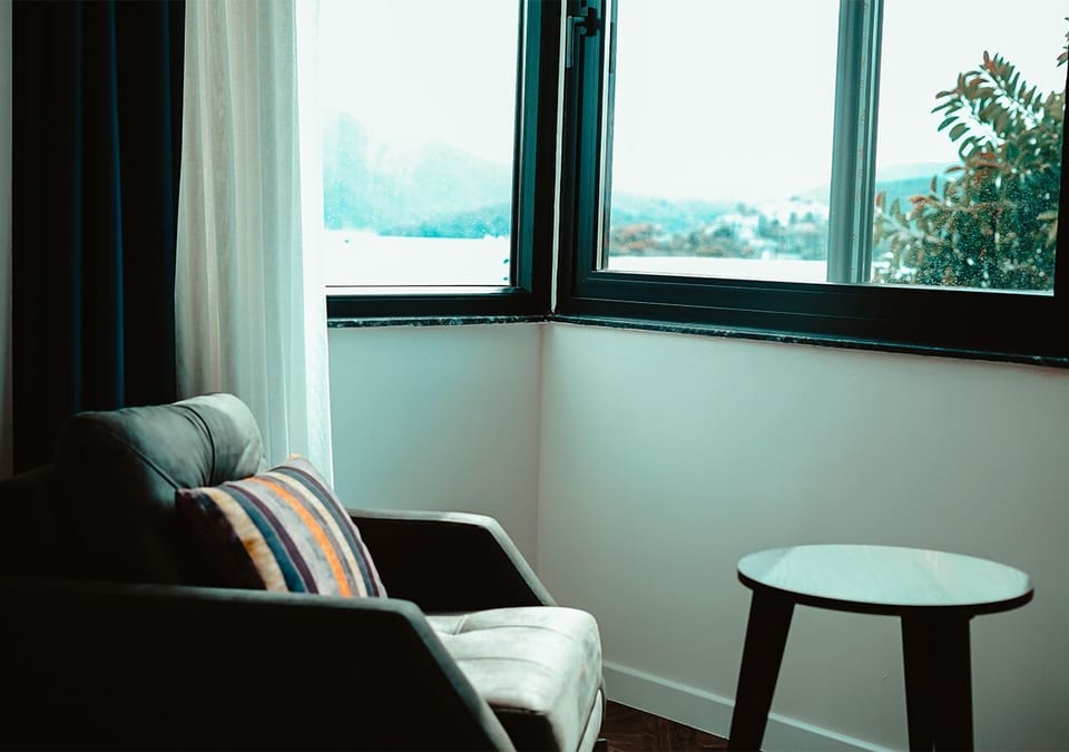 Classic Triple Room, Partial Sea View | In-room safe, blackout drapes, free WiFi, bed sheets