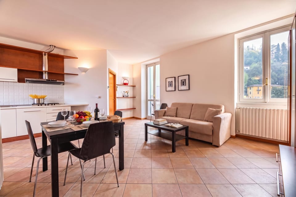 Family Apartment, 1 Bedroom, Balcony (Varenna Lake View 2) | Living area | Flat-screen TV