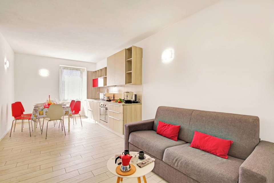 Standard Apartment, 2 Bedrooms, Microwave (Appartamento Dei Tigli with A/C) | Living area | Flat-screen TV