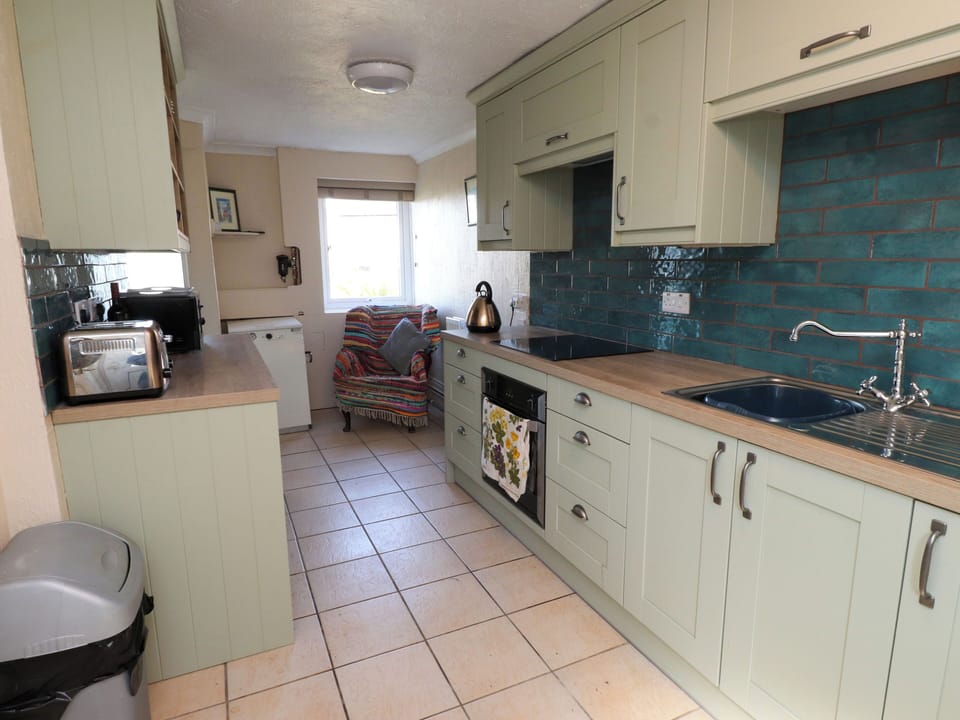 Fridge, microwave, toaster, cookware/dishes/utensils