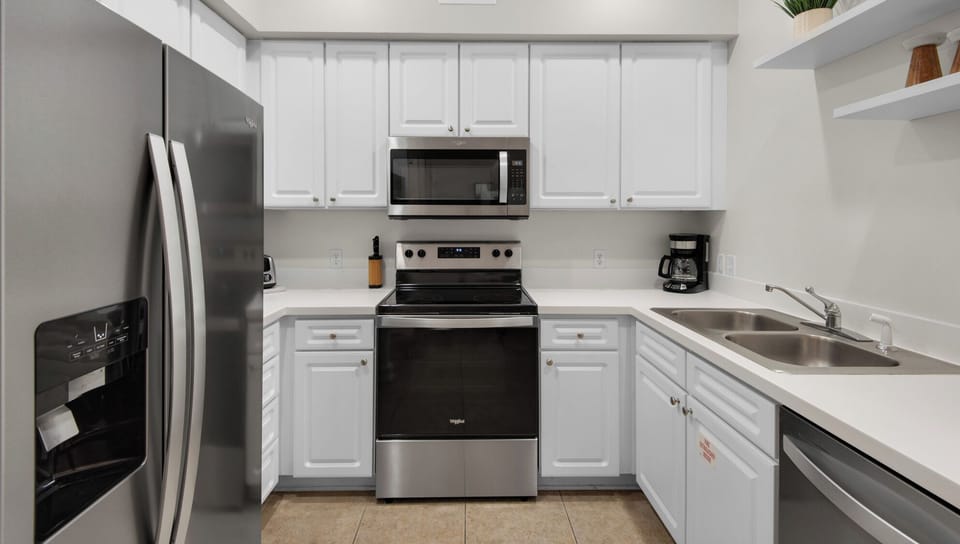 Condo, Multiple Beds, Balcony, Garden View (The Village Unit 626) | Private kitchen | Fridge, microwave, oven, stovetop