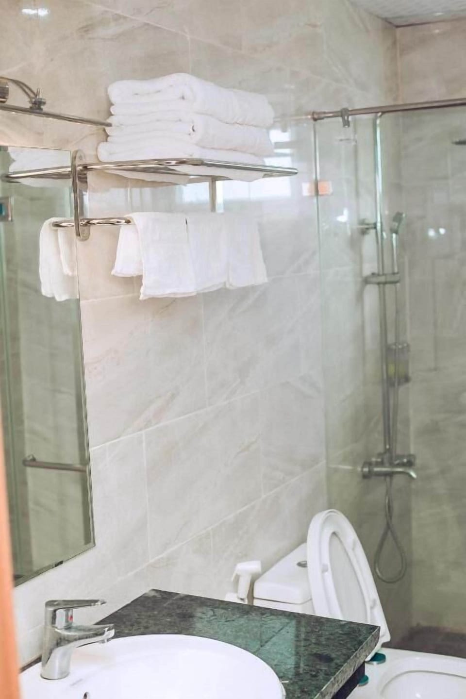 Shower, free toiletries, hair dryer, towels