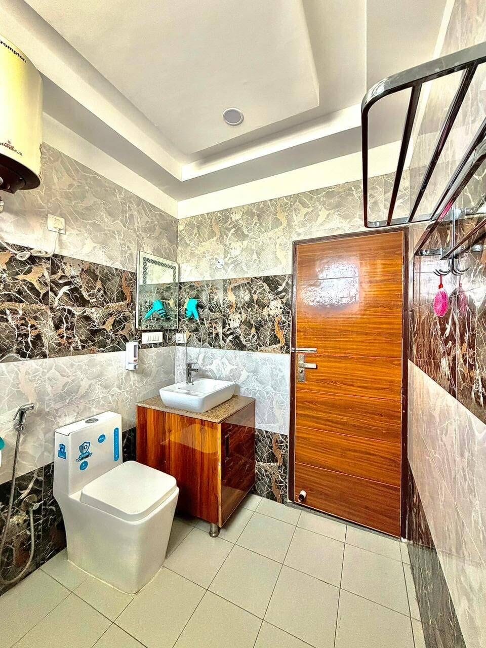 Premium Double Room, Balcony, City View | Bathroom | Shower, hair dryer, towels, soap