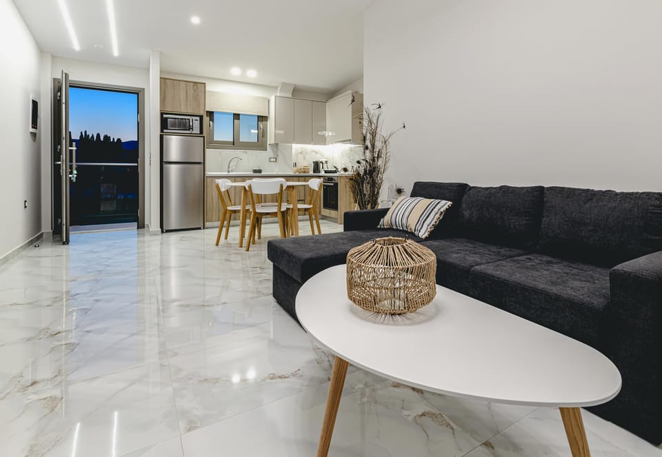 Suite, 1 Bedroom | Living area | 50-inch flat-screen TV with cable channels