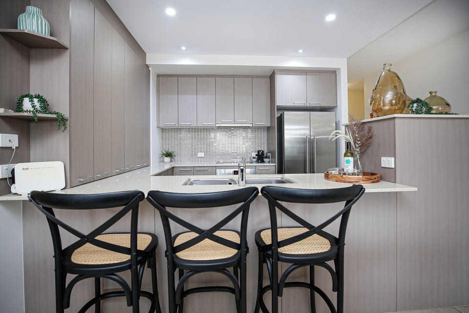 Deluxe Apartment, Balcony, Pool View | Private kitchen | Full-size fridge, microwave, oven, stovetop