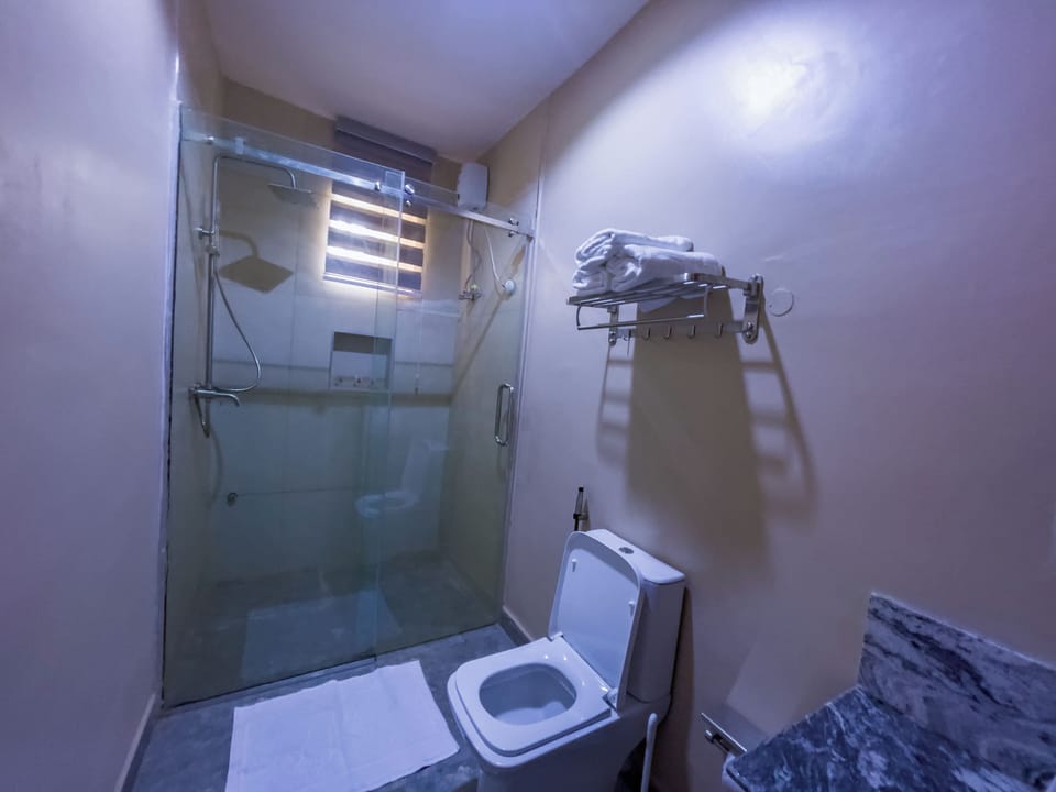 Business Apartment, 3 Bedrooms, Balcony, Courtyard View | Bathroom | Shower, rainfall showerhead, soap
