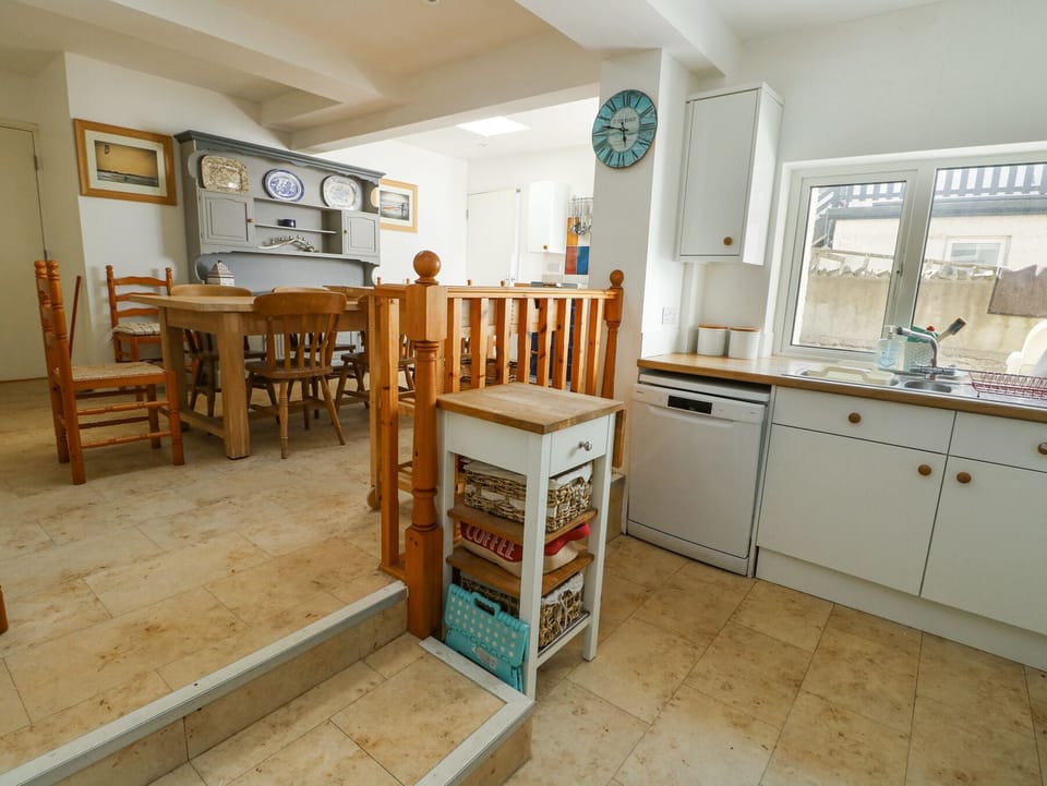 Fridge, dishwasher, toaster, cookware/dishes/utensils
