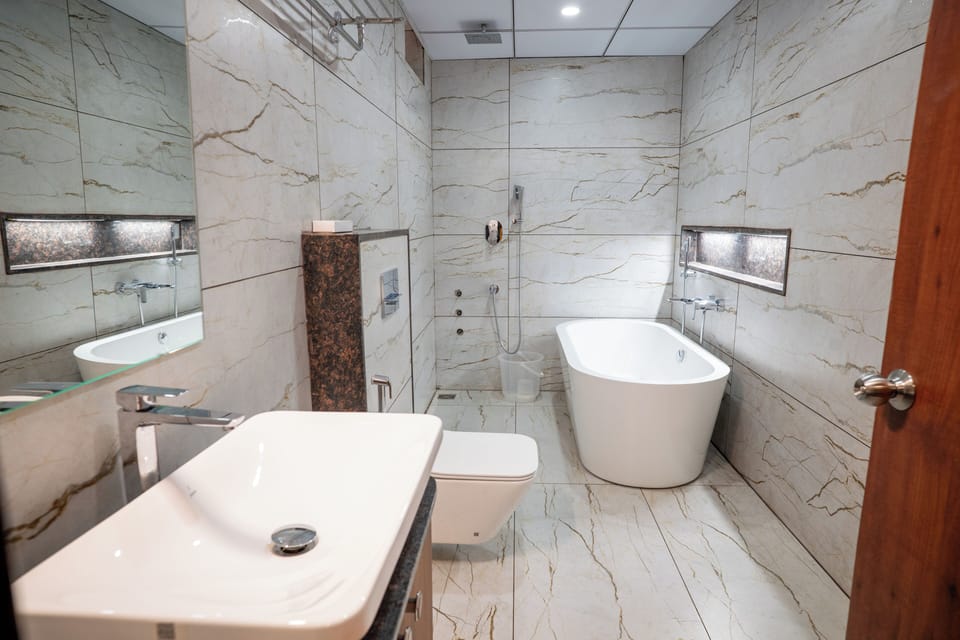 Suite, City View | Bathroom | Towels, soap, shampoo, toilet paper