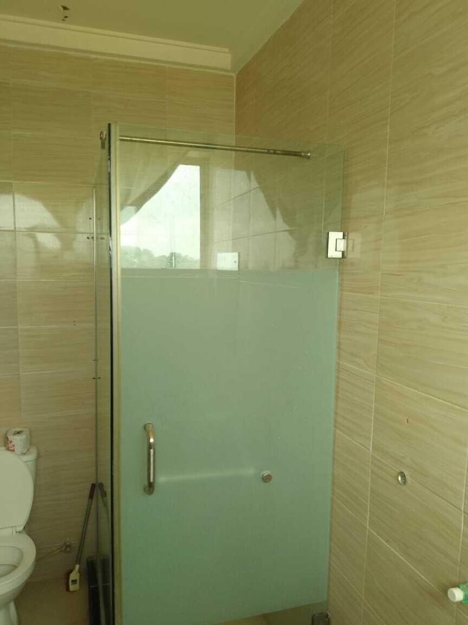 Shower, towels, soap, toilet paper
