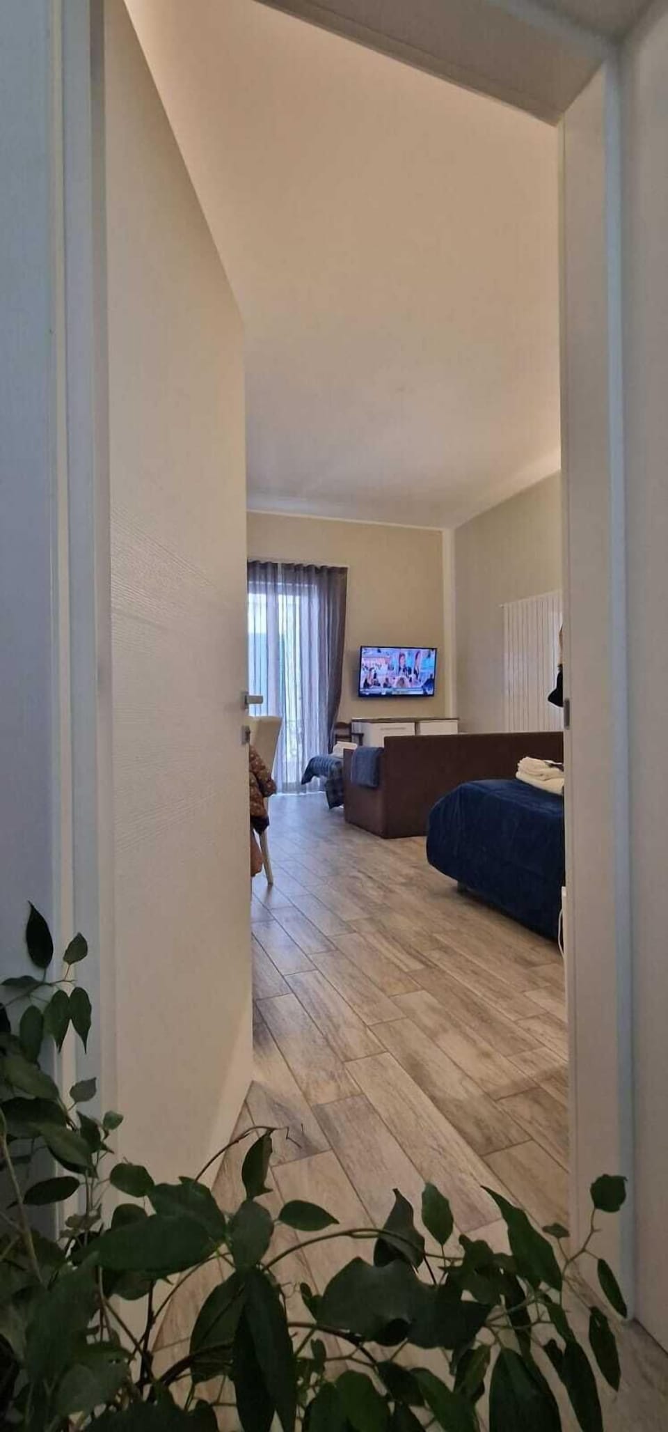 Deluxe Quadruple Room, Balcony | Laptop workspace, iron/ironing board (on request), WiFi (free)