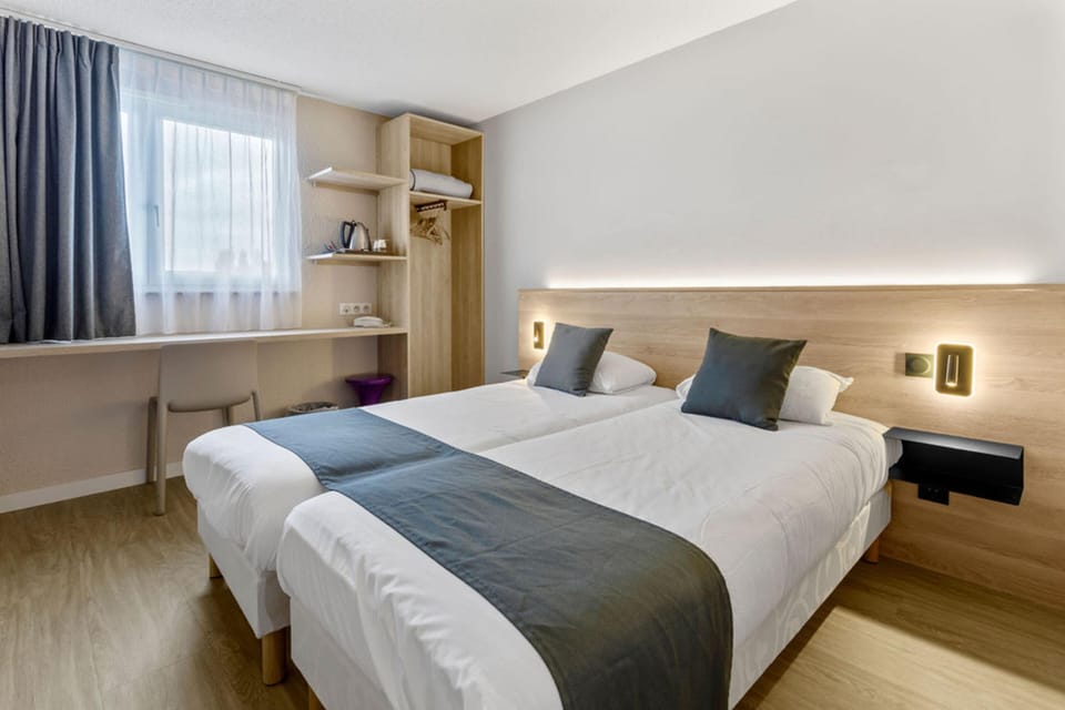 Standard Room, 2 Twin Beds | Desk, laptop workspace, iron/ironing board, free cribs/infant beds