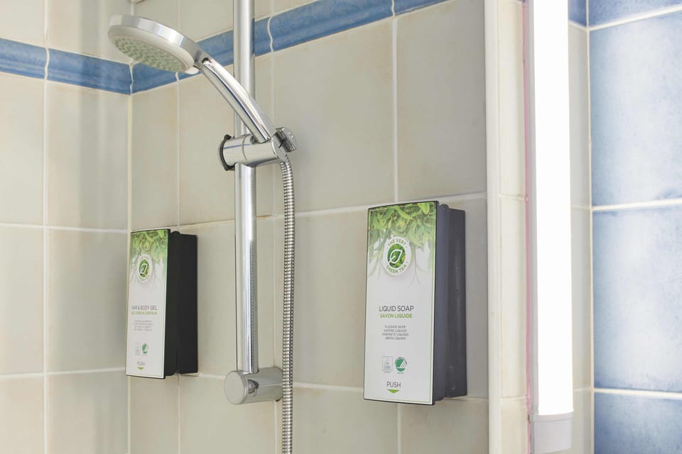 Combined shower/tub, eco-friendly toiletries, hair dryer, towels