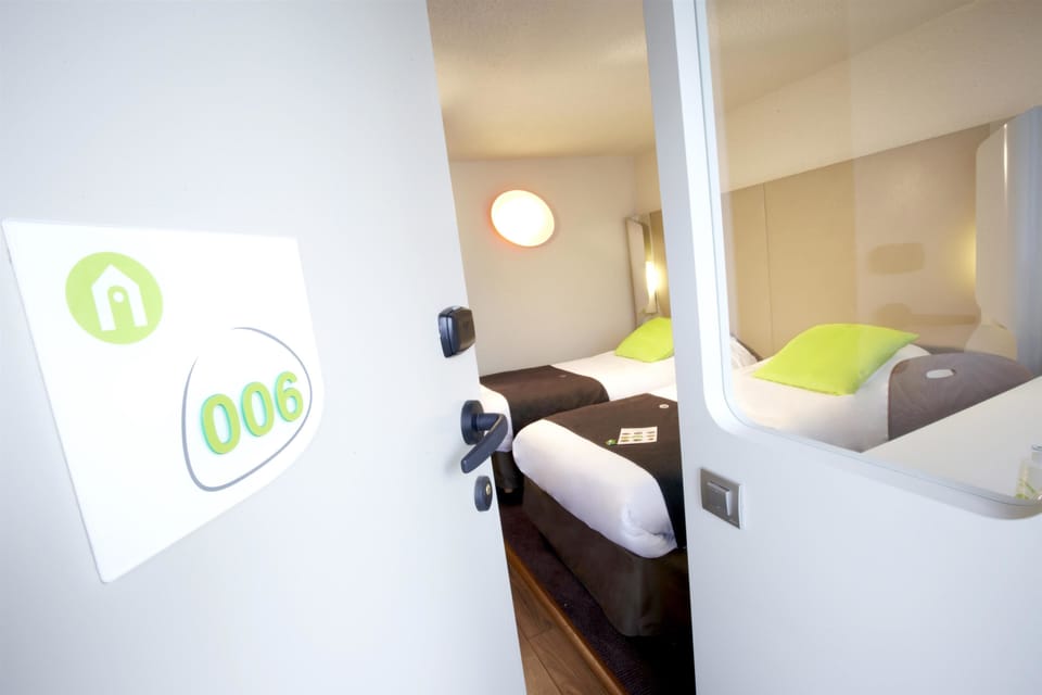 Premium bedding, desk, blackout drapes, soundproofing