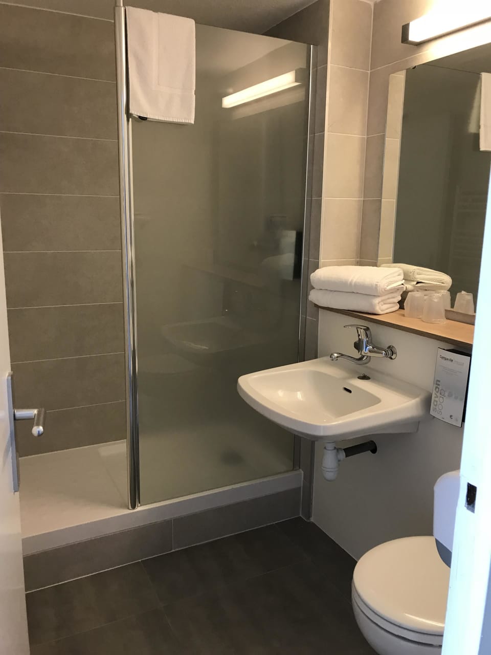 Bathtub, eco-friendly toiletries, hair dryer, towels