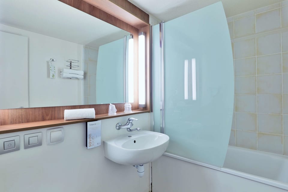Eco-friendly toiletries, hair dryer, towels, soap