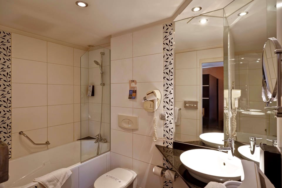 Eco-friendly toiletries, hair dryer, towels