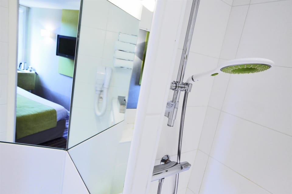 Eco-friendly toiletries, hair dryer, towels