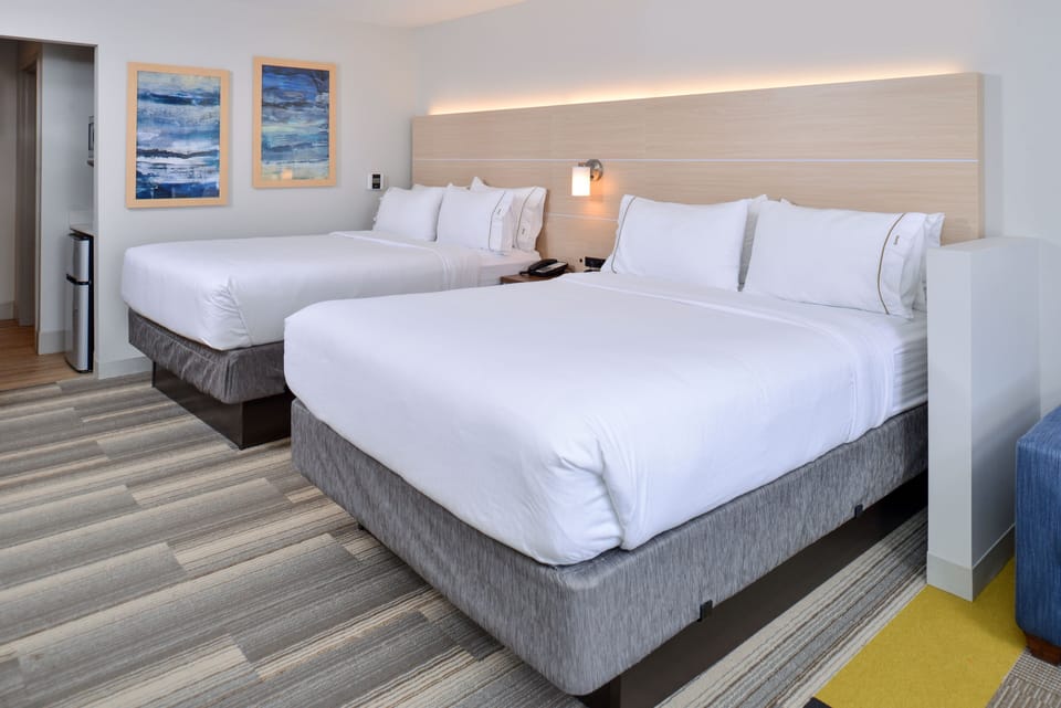 Desk, blackout drapes, iron/ironing board, free cribs/infant beds