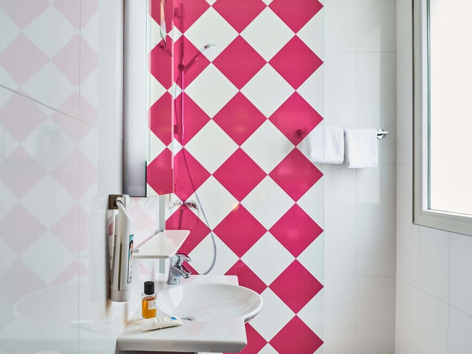 Shower, eco-friendly toiletries, hair dryer, towels