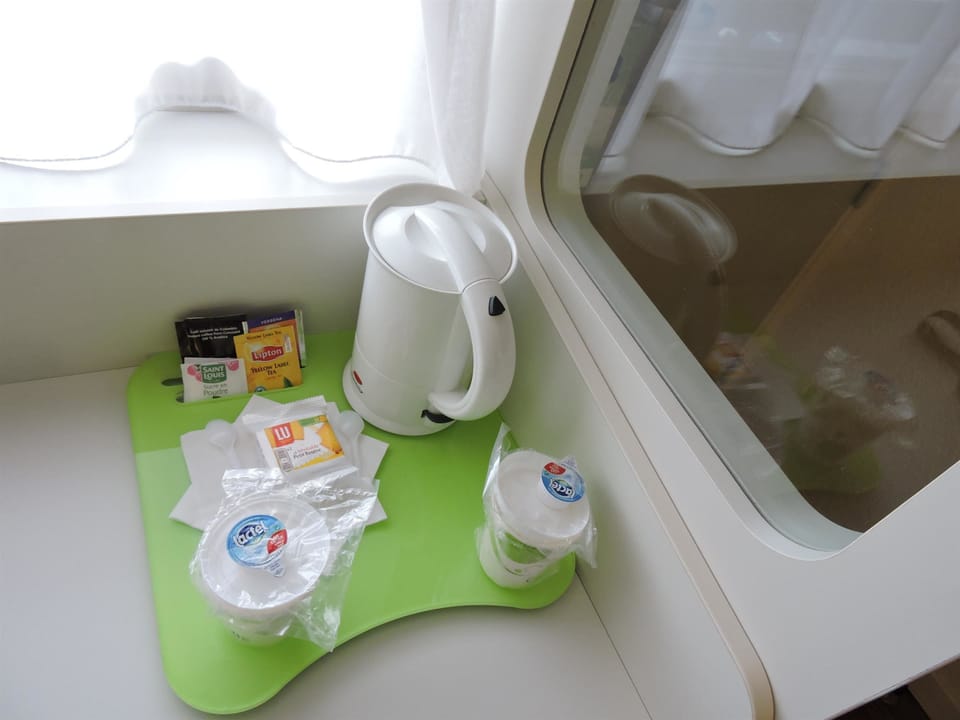 Desk, soundproofing, iron/ironing board, free cribs/infant beds