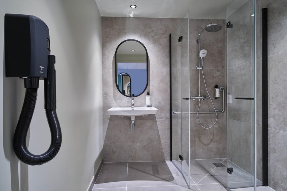 Eco-friendly toiletries, hair dryer, towels