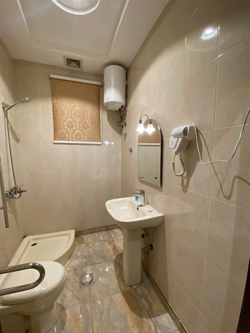 Deluxe Double Room, Courtyard View | Bathroom | Shower, slippers, bidet, towels