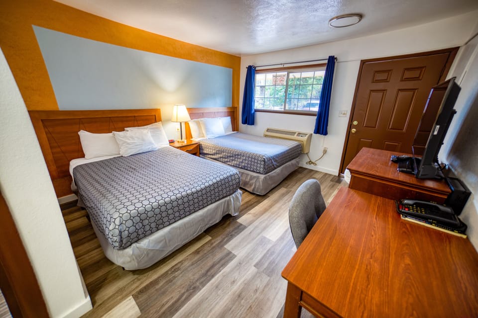 Basic Room, 2 Queen Beds, Non Smoking | Free WiFi, bed sheets