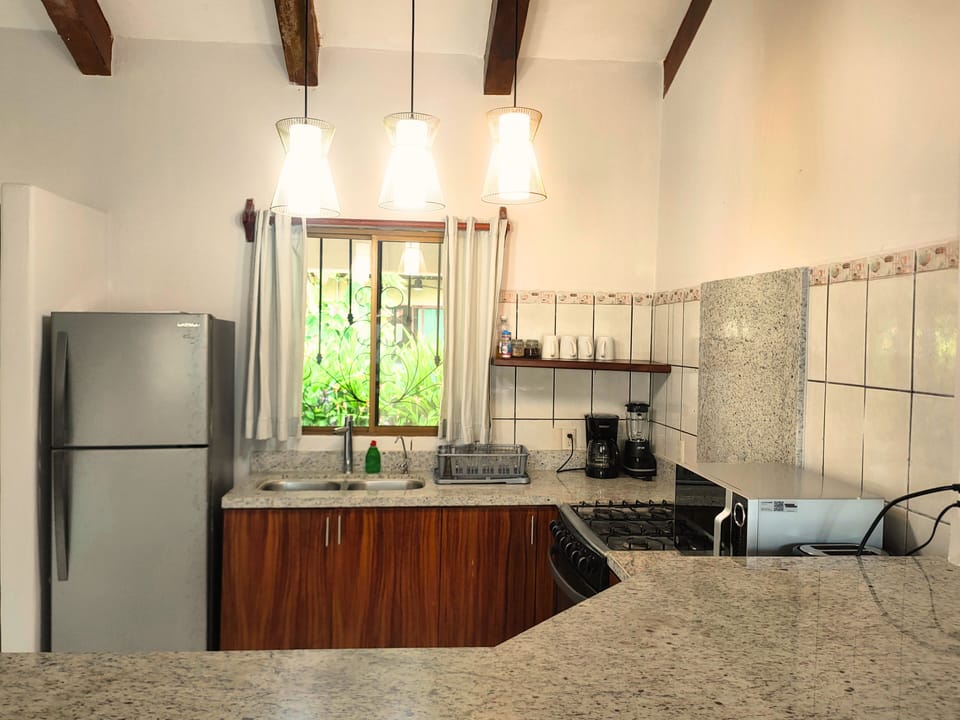 Family Apartment, 2 Bedrooms | Private kitchen | Mini-fridge, stovetop, cookware/dishes/utensils