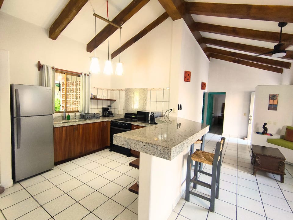 Family Apartment, 2 Bedrooms | Private kitchen | Mini-fridge, stovetop, cookware/dishes/utensils