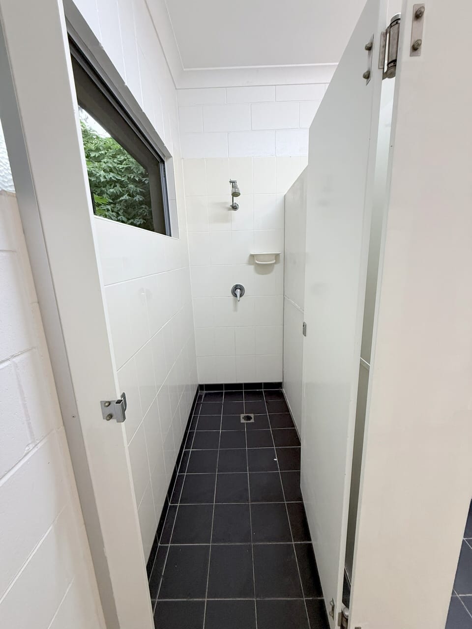 Shower, towels, soap, toilet paper