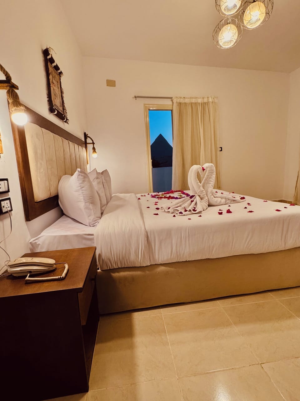 Premium bedding, down comforters, pillowtop beds, minibar