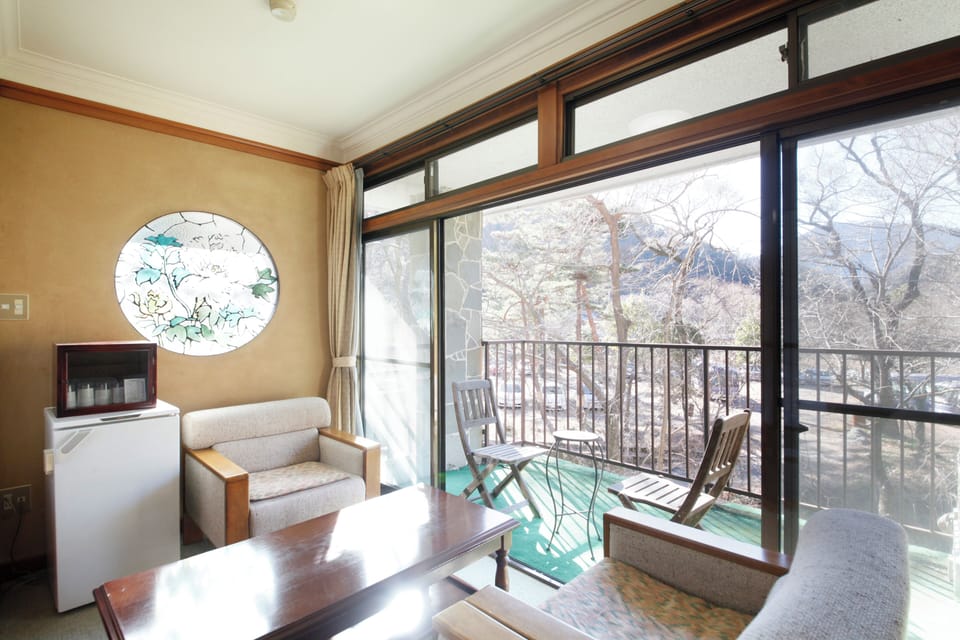 Suite, Garden View | In-room safe, desk, iron/ironing board, free WiFi