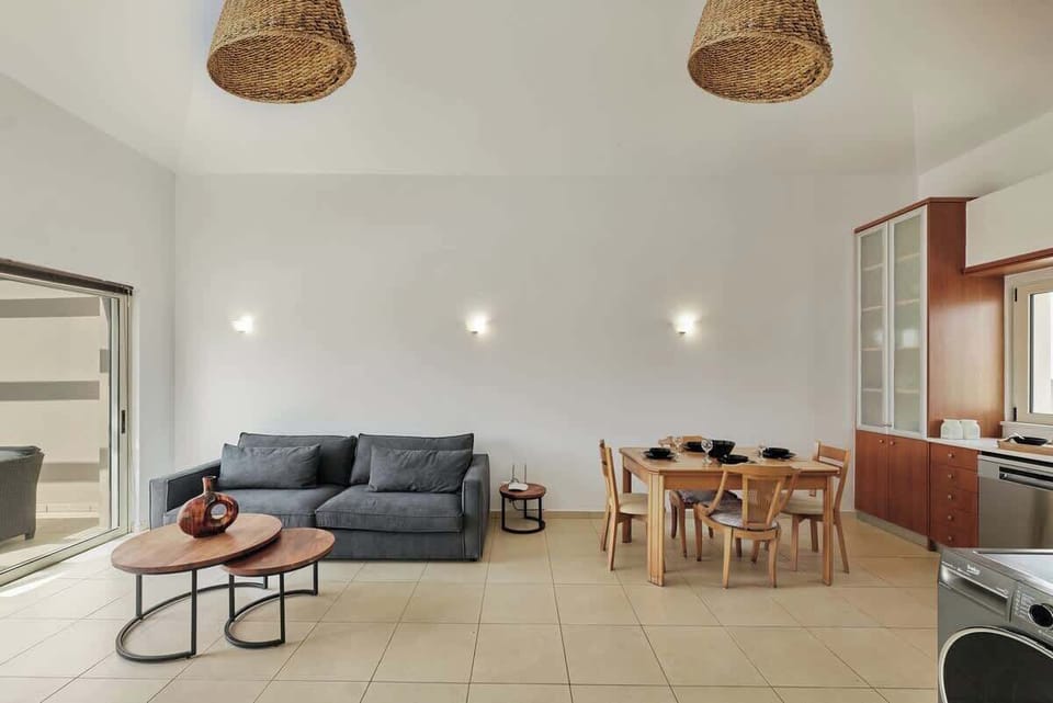 Basic Room, Pool View | Living area | Flat-screen TV