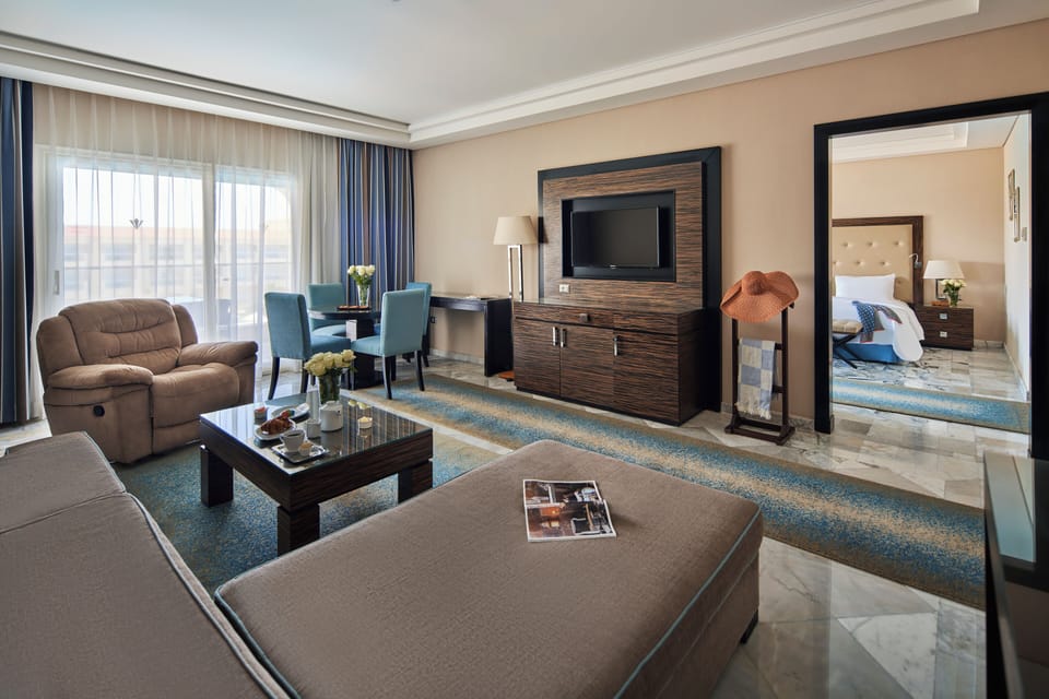 Junior Suite, 1 Bedroom, Sea View | Minibar, free cribs/infant beds, free WiFi, bed sheets