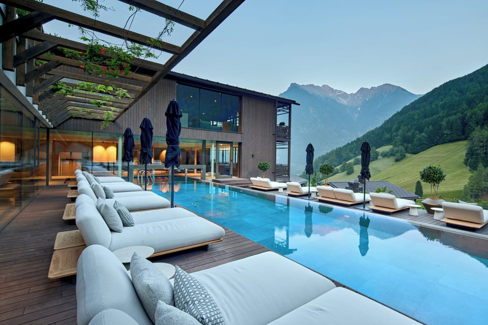 Indoor pool, outdoor pool, pool umbrellas, sun loungers