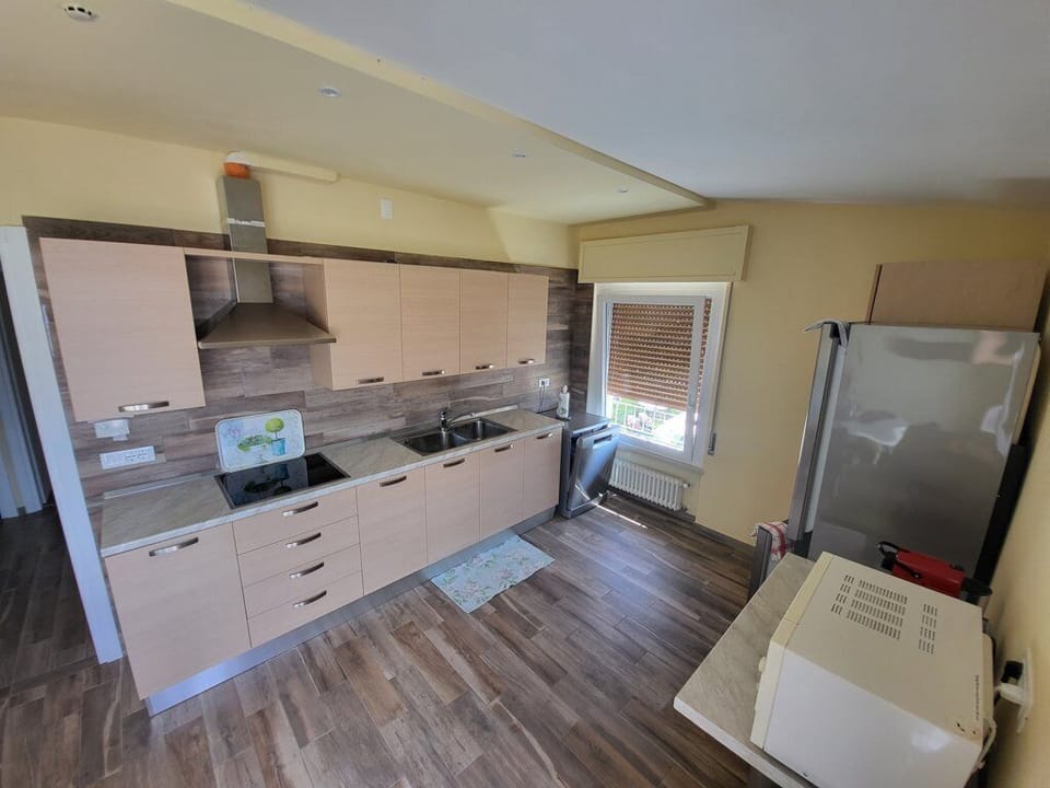 Apartment, 3 Bedrooms, 2 Bathrooms | Private kitchen | Full-size fridge, microwave, coffee/tea maker, electric kettle