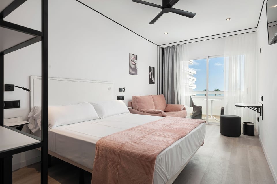 Double Room, Balcony, Sea View | Down comforters, minibar, in-room safe, desk