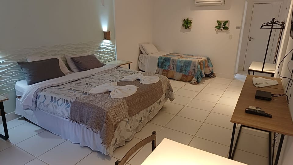 Family Triple Room, Lanai, Partial Sea View | Free WiFi