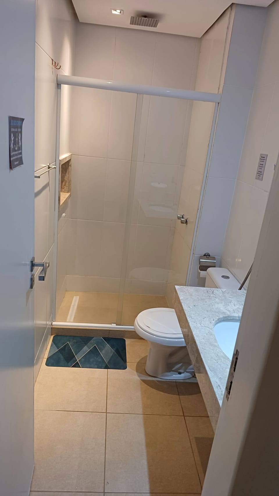 Shower, towels, soap, toilet paper