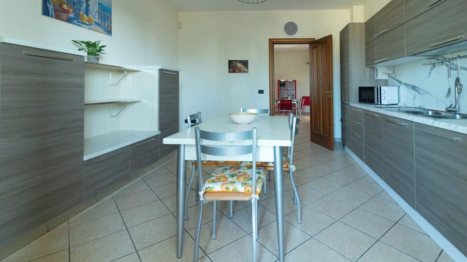 Deluxe Apartment, City View | Private kitchen | Espresso maker, coffee/tea maker, electric kettle